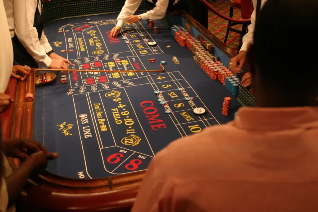 craps table form above peoples hands visible